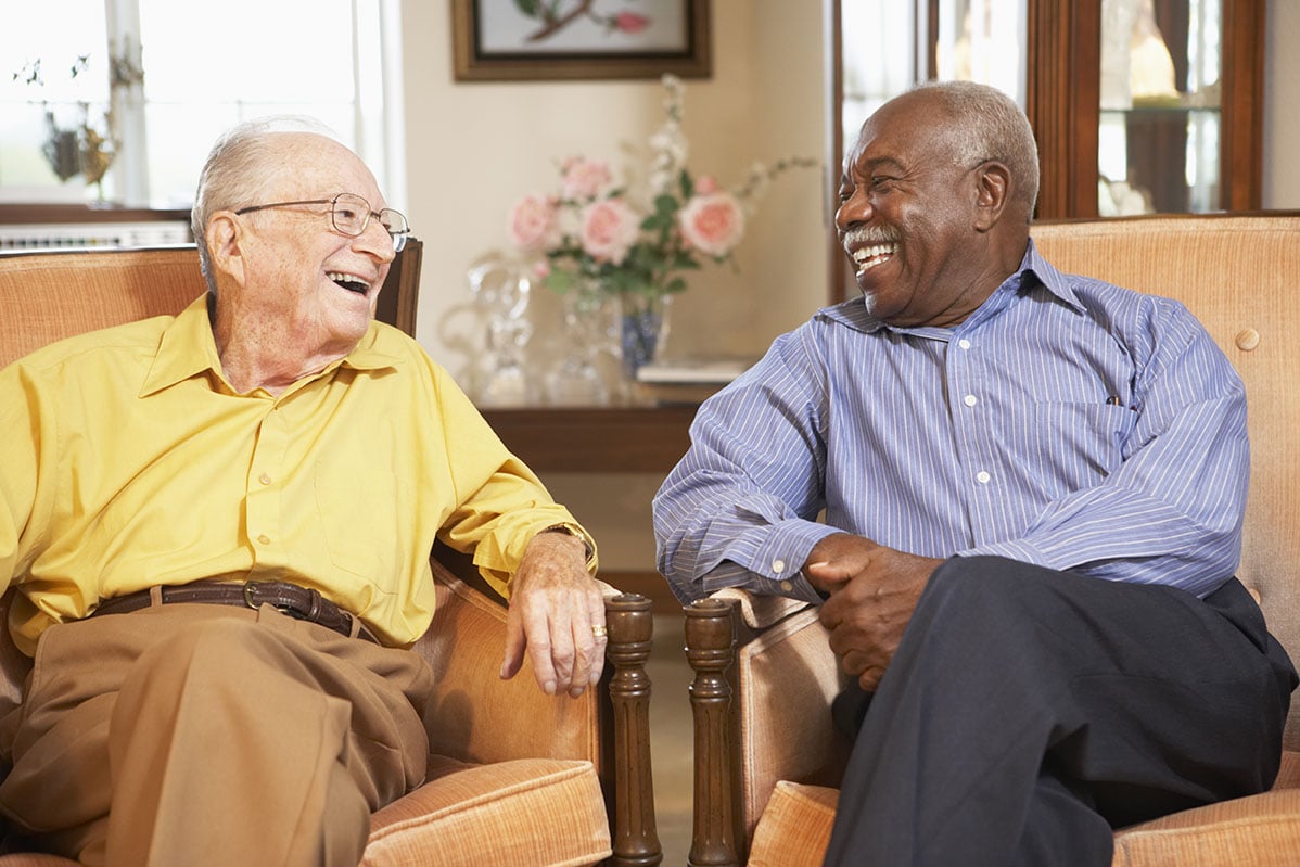 Residents laughing together at Parker Place